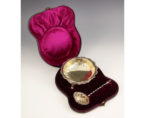 A cased Victorian silver sugar bowl and sifter spoon, William Hutton &amp; Sons, London 1884, the beaded rim of the sugar bow