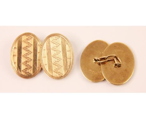 A pair of 9ct yellow gold cufflinks, the oval links with engraved and engine turned detail, with trace link chain links, stam