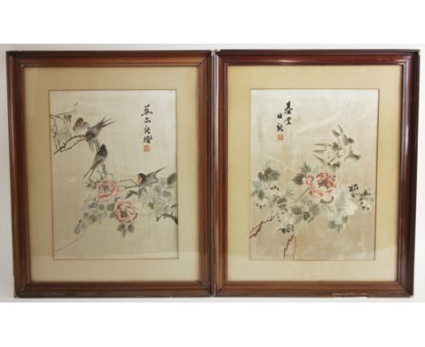 A pair of Chinese silk embroidered panels, late 19th century, each rectangular panel embroidered with blossoming peony branch