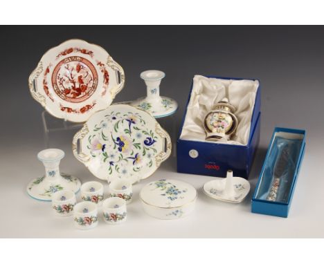 A collection of boxed Coalport porcelain comprising: five napkin rings and a cake knife in the 'Ming Rose' pattern, two candl