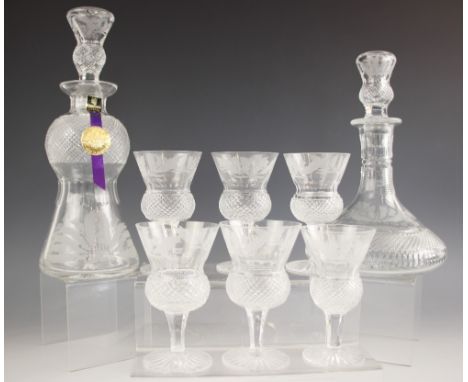 An Edinburgh Crystal decanter and stopper, modelled as an inverted thistle, the hobnail cut shoulders above a flared body wit