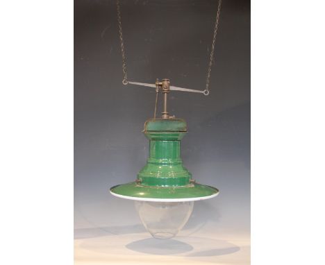 An enamelled railway station pendant oil lamp, early 20th century, the green and white shade of dish form with a bulbous glas