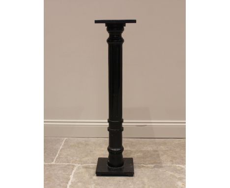 An ebonised hardwood jardinière stand, early 20th century, the fluted and ring turned column upon an integral plinth base, 98