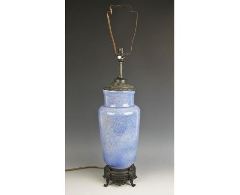 A Ruskin style vase/lamp base, the speckled blue baluster shaped vase with garland decorated top and pierced base upon four s