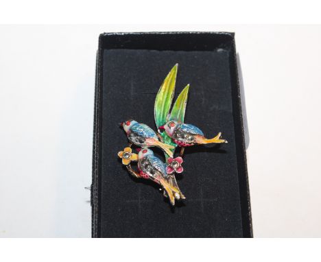 A vintage enamel and marcasite three bird brooch