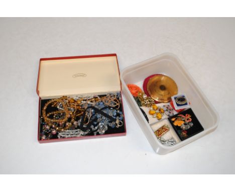 Two boxes of vintage and other costume jewellery to include bead necklaces and brooches 