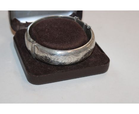 1964, Birmingham Sterling silver hinged bangle, 24.5gms 