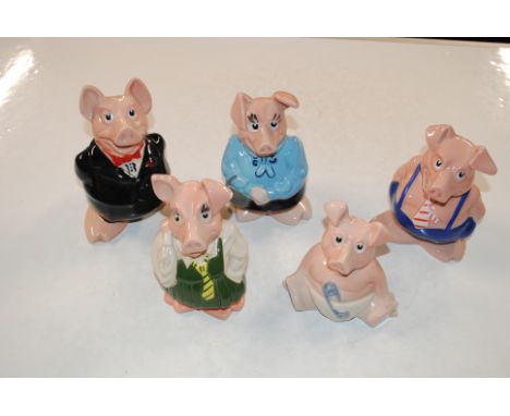 A set of Wade Nat West piggy banks 