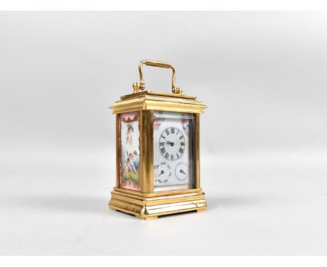 A Miniature Sevres Style Gilt Brass Carriage Clock with Subsidiary Dials for Day and Date, Porcelain Panels, 10cms High Max 