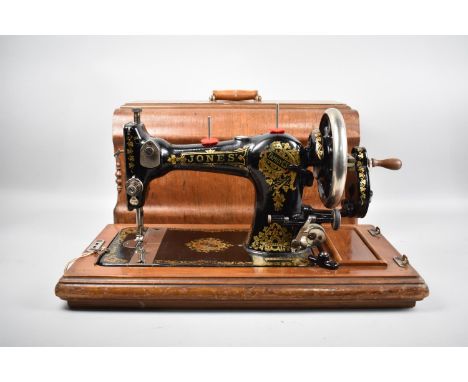 A Manual Cased Jones Sewing Machine 