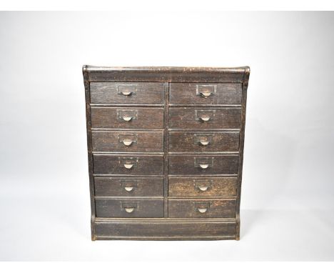 An Edwardian Globe Wernicke Twelve Drawer Base Unit, 70cms Wide and 35cms Deep and 79.5cms High 