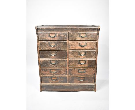 An Edwardian Globe Wernicke Twelve Drawer Base Unit, 70cms Wide and 35cms Deep and 79.5cms High 