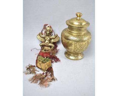 A Polished Bronze Lidded Temple Jar Decorated with Oriental Scene together with a Brass and Silk Wall Hanging depicting Thai 