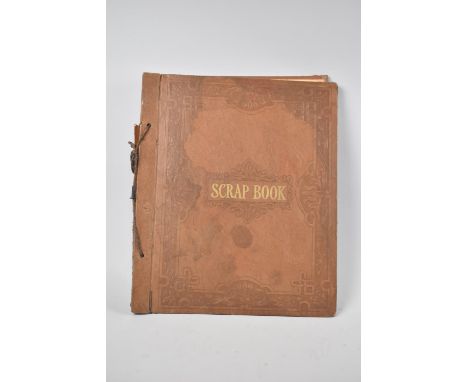 A Vintage Scrapbook Containing Various Playing Card Patterns 