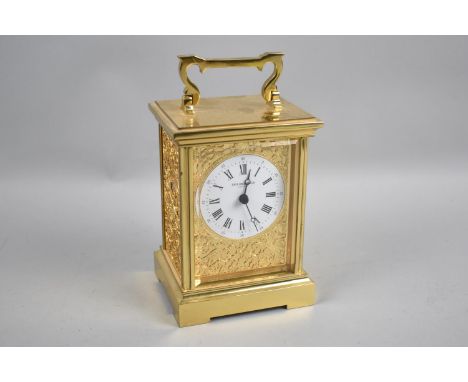 A Modern Gilt Brass Carriage Clock with Battery Movement, 14cms High 