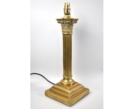 A Heavy Brass Table Lamp in the Form of a Reeded Corinthian Column on Stepped Base, No Shade, 46cms High 