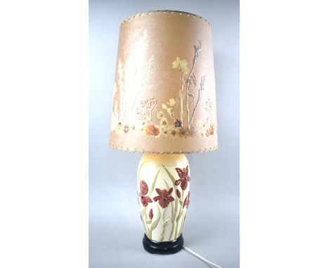 A Modern Ceramic table Lamp Decorated in Relief with Flowers, Complete with Decorative Shade, Overall Height 64cms 