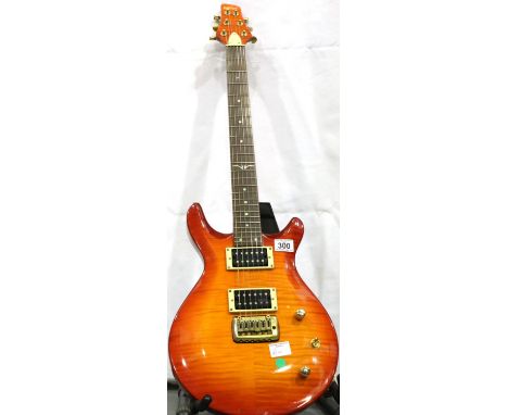 Solid body electric guitar by Vintage. Not available for in-house P&amp;P, contact Paul O'Hea at Mailboxes on 01925 659133 