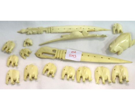 Collection of carved antique ivory items including graduated elephants, crocodiles etc. P&amp;P Group 1 (£14+VAT for the firs