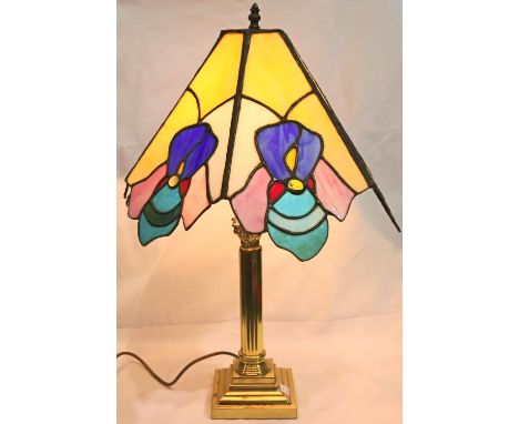 A large Tiffany style leaded glass light shade on a  brass columnar base, overall H: 65 cm. Not available for in-house P&P, c