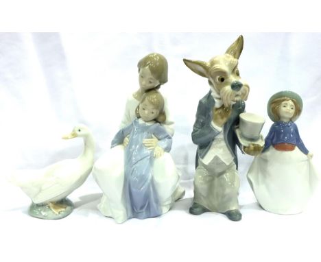 Nao; four ceramic figurines including a boxed example, largest H: 23 cm. No cracks, chips or visible restoration.  P&amp;P Gr