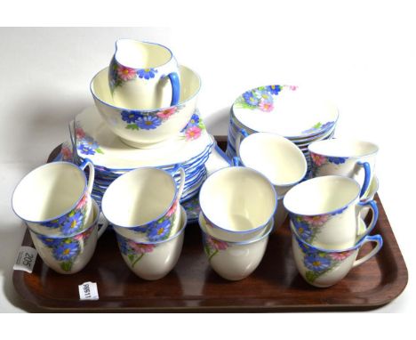 A Shelly floral painted part tea service 