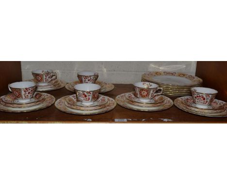 A Royal Crown Derby, Red Derby Panel pattern part tea and dinner service 