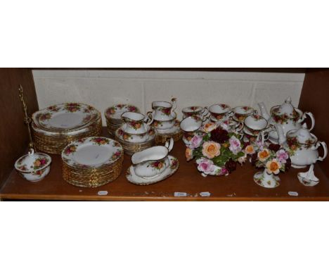 A Royal Albert Old Country Roses dinner/tea service; together with a large posy 