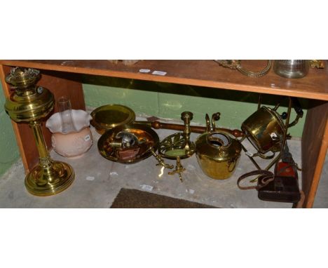 A Victorian brass oil lamp, pink glass shade; together with various brasswares etc