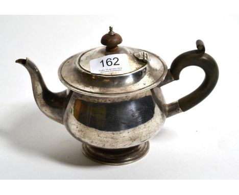 A bachelors' silver pedestal teapot, William Hutton &amp; Son, Birmingham 1938, 13cm high, 11.9ozt 