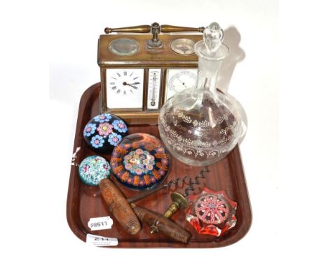 Four Victorian and later millefiori paperweights, one monogrammed J; two 19th century corkscrews; an enamel decorated glass d
