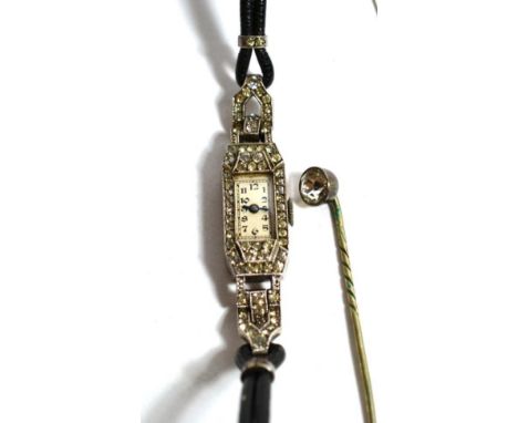 A lady's Art Deco silver cased cocktail watch set with brilliant cut simulants, with original leather strap; a paste set stic