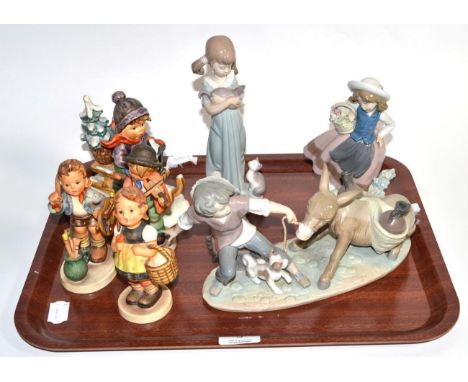 A group of four Goebel Hummel figures; and three Lladro figures .  Lladro No. 5221, good condition; No. 5743, good condition;