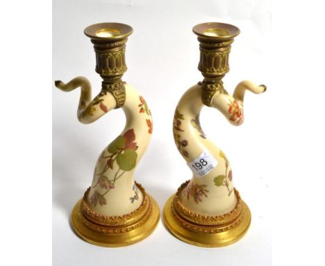 Pair of Worcester 1056 blush ivory candlesticks .  One stick with restoration to drip tray at the neck, otherwise both appear