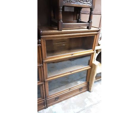 Early 20th century oak three tier Globe Wernicke bookcase with drawer below, 87cm wide, 31cm deep, 124.5cm high