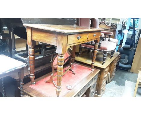 Late Victorian two drawer side table on turned legs with ceramic castors, 105cm wide, 52cm deep, 72cm high