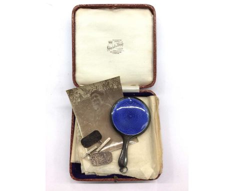 Pair of textured silver cufflinks, together with a silver and blue enamel miniature hand mirror, within an  antique jewellery