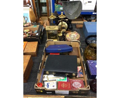 Sundry items, including a set of scales, a gong, candlesticks, card games, studio pottery, and a clock