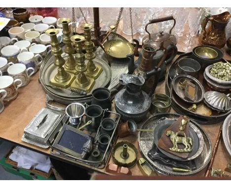 Group of mixed metalware to include brass scales and candlesticks, silver plated oval tray and entreé dish and other items.