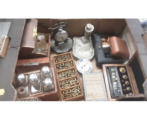 Box of miscellaneous items to include a pocket watch stand, clock parts/balance wheels, scent bottles in leather case and sun