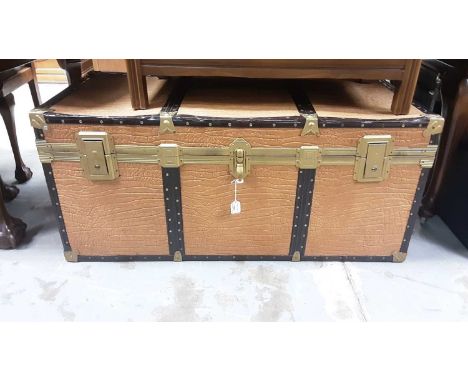 Large brass bound trunk, 120cm wide, 56cm deep, 54cm high, together with a dome top trunk (2)
