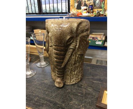 A ceramic stool modelled as an elephant, 44cm highIn good condition with no damage.