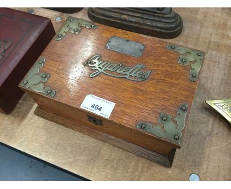 Early 20th century oak cigarette box dated to interior 1914, with applied silver plaque 'to F. R. Goodey by the Battersea Pos