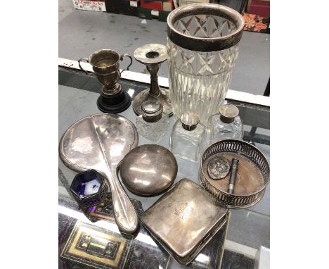 Group of silver including trophy, one candlestick, wine coaster, mirror, cigarette case, salt, silver topped glass bottles an