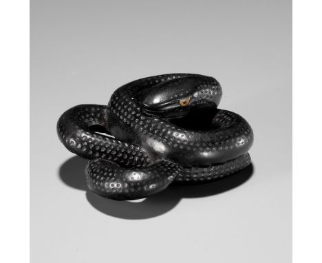 A RARE EBONY WOOD NETSUKE OF COILED SNAKEUnsignedJapan, possibly Iwami, 18th-19th century, Edo period (1615-1868)The snake (h