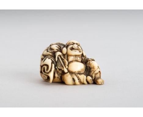 AN IVORY NETSUKE OF HOTEI WITH HIS TREASURE BAGJapan, 18th century, Edo period (1615-1868)Carved as the seated Hotei, his fac