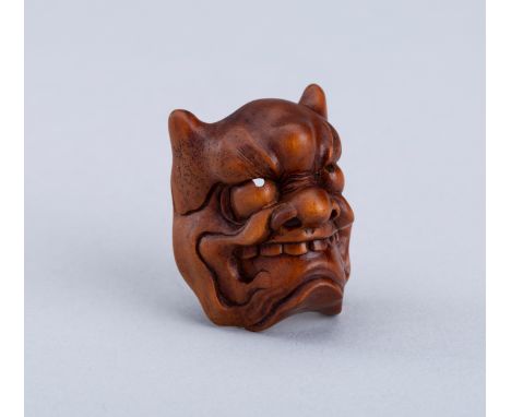 RYUKEI: A WOOD MASK NETSUKE OF AN ONI, 19th CENTURYBy Ryukei, signed Ryukei 龍珪Japan, 19th centuryWell carved as a mask of an 