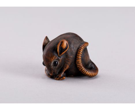 AFTER TOMOTADA: A WOOD NETSUKE OF A RAT WITH A BEAN-PODInscribed Tomotada 友忠Japan,19th centuryWell carved as a rat seated on 