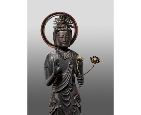 A GILT AND LACQUERED WOOD FIGURE OF KANNON BOSATSU HOLDING LOTUS BLOSSOMS  Japan, c. 1600, late Momoyama (1573-1600) to early