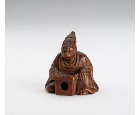 A FINE WOOD NETSUKE OF A TEMPLE SERVANTJapan, Meiji period (1868-1912)Carved seated, wearing a loose-fitting robe carved with